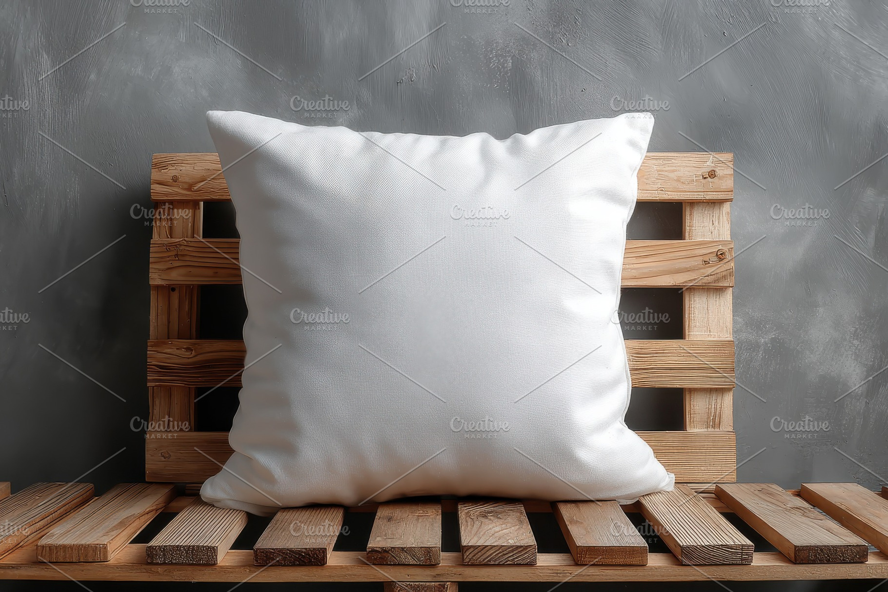 White pillow on wooden pallet bench, a Photo by Pixeness Studio