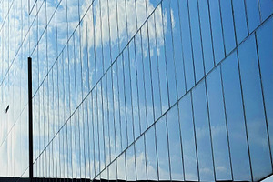 Tall building reflecting the sky, an Architecture Photo by ArtBackground