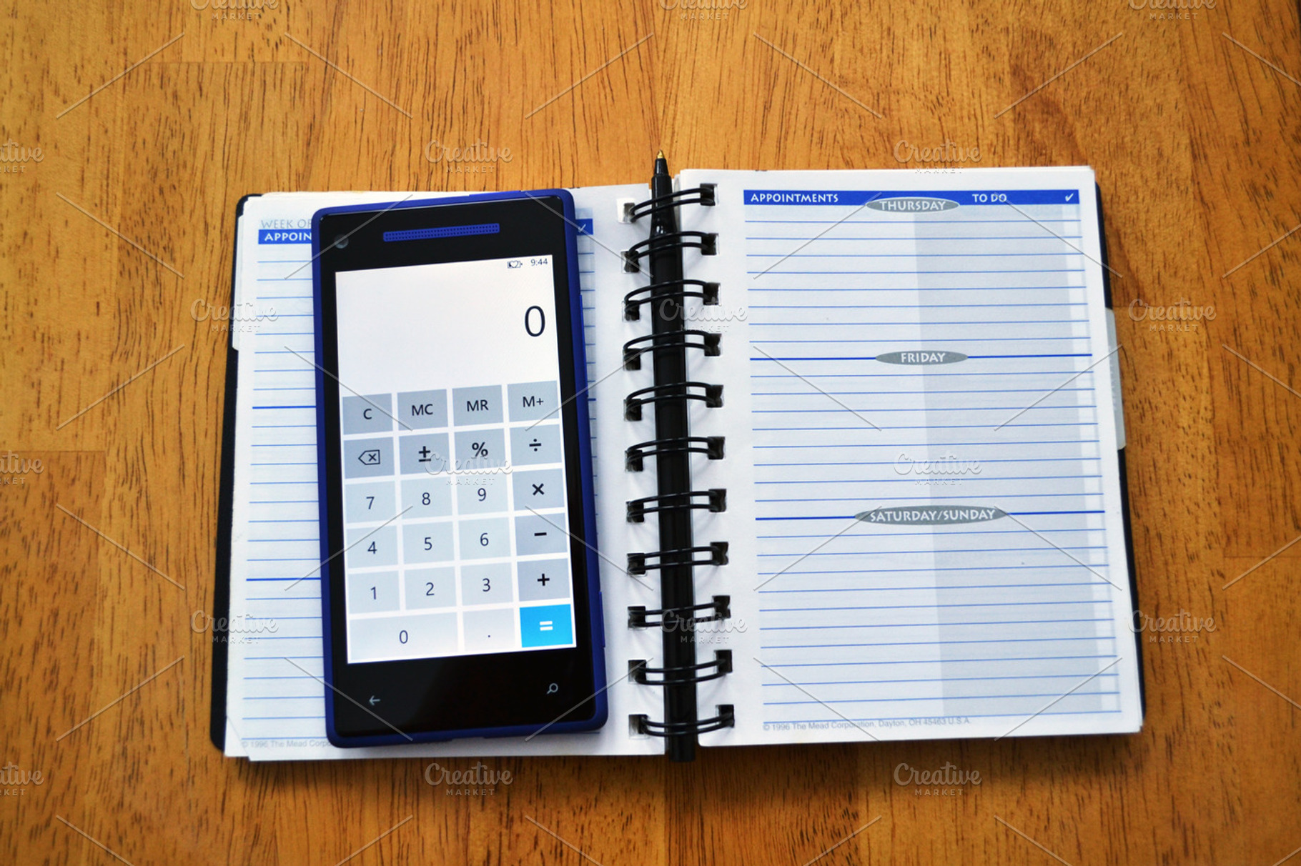Daily planner stock photo containing smartphone and cell phone