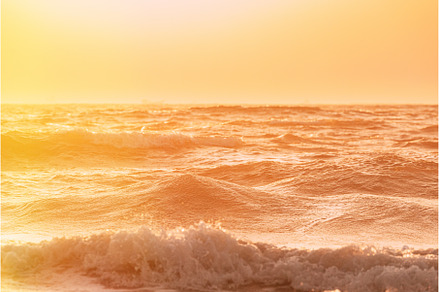 Evening sunset above sea. Riplpe sea, a Nature Photo by Our Amazing World