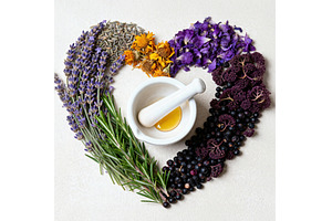 Herbs arranged in heart shape around, a Background Photo by tilialucida