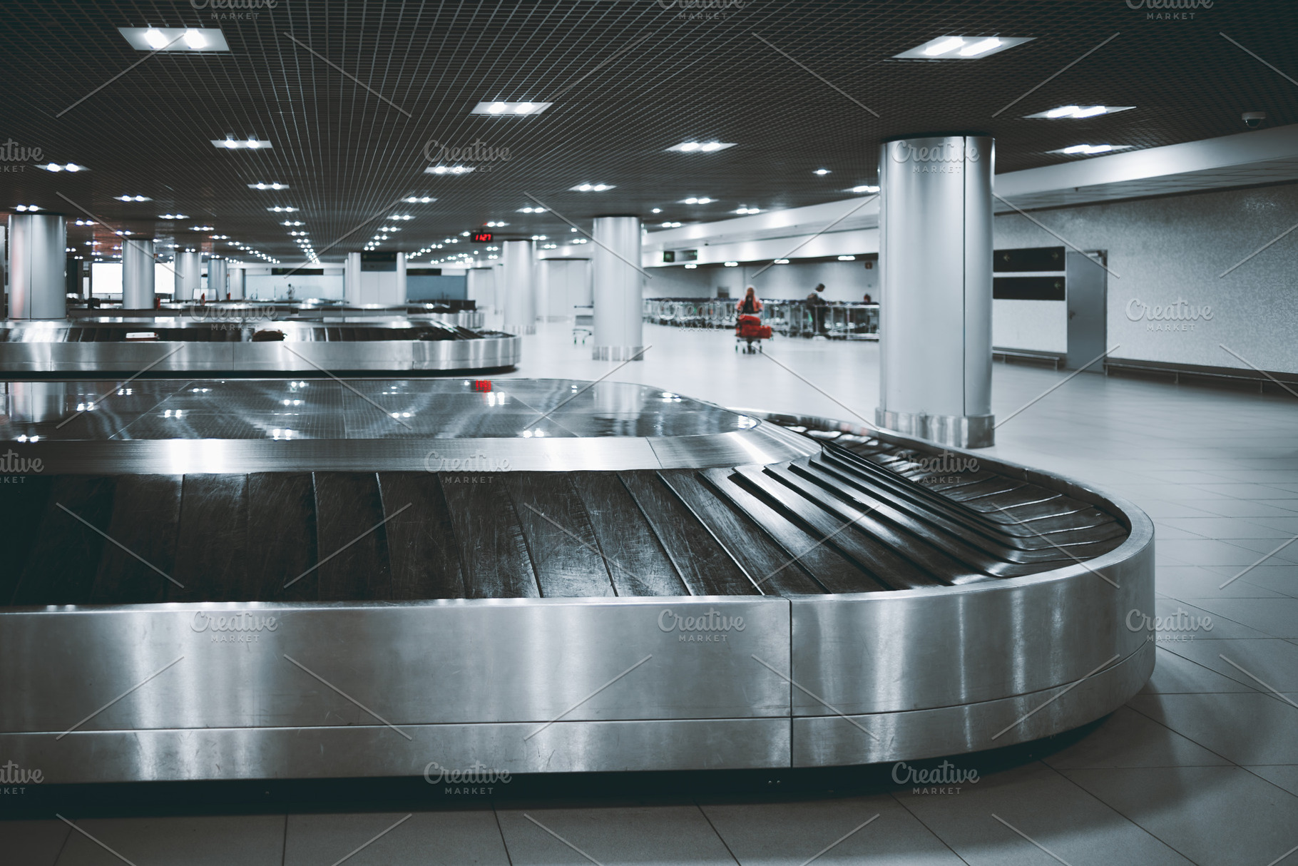 Empty airport baggage claim carousel, a Transportation Photo by SkyNext