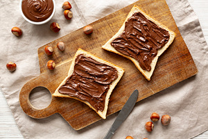 Homemade Chocolate Hazelnut Toast, top view. Flat lay, overhead., a Food & Drink Photo by LiudmylaChuhunova