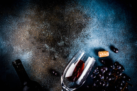 Wine bottle with glass and grapes featuring wine, red, and dark, a Food & Drink Photo by Rimma