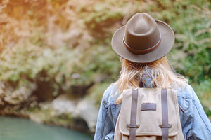 Female traveler walking outdoor.