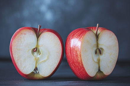Two halves of apples, cut and placed, a Photo by Iftikhar Alam