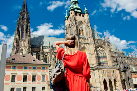 Beautiful girl in red dress travel in Prague,, a Person Photo by Masson Simon
