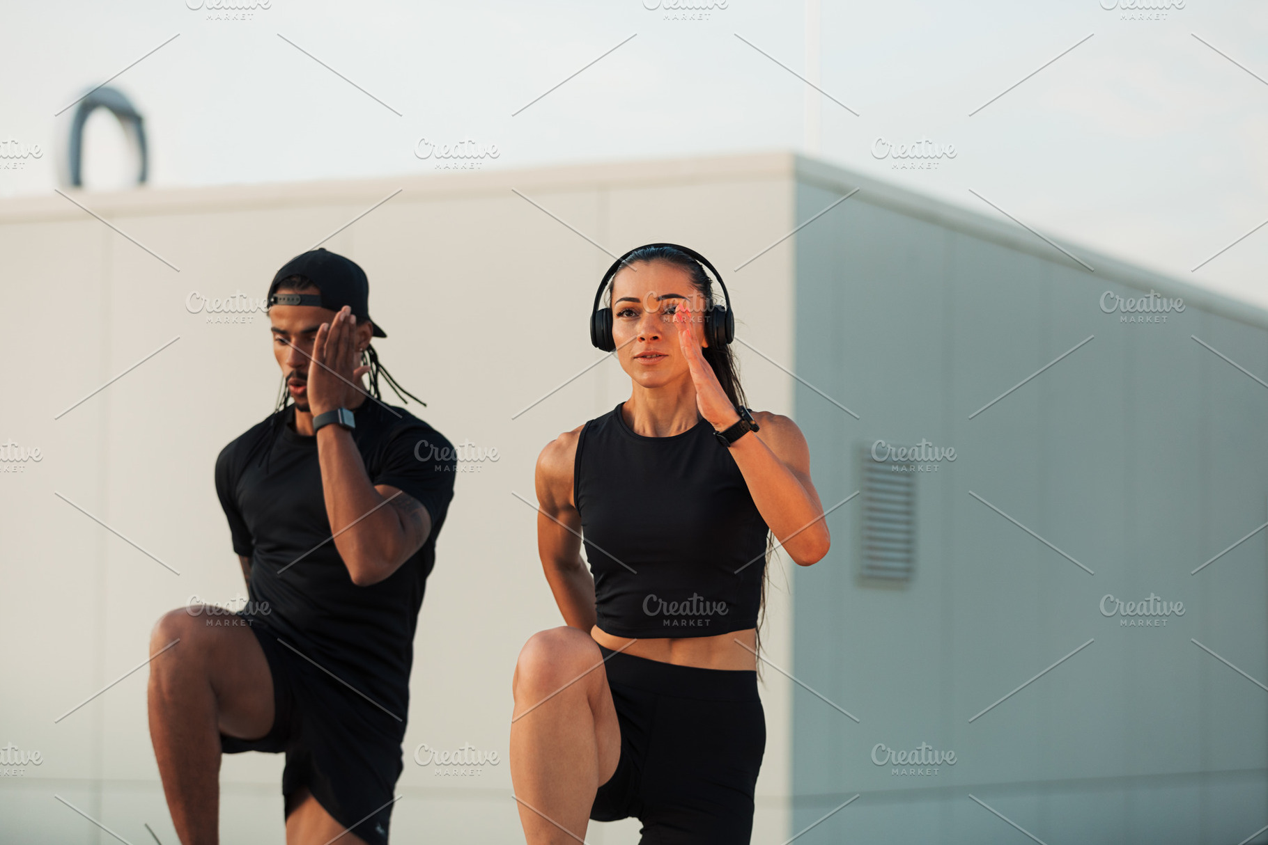 Two athletes doing warming-up, a Sports & Recreation Photo by Artem Varnitsin