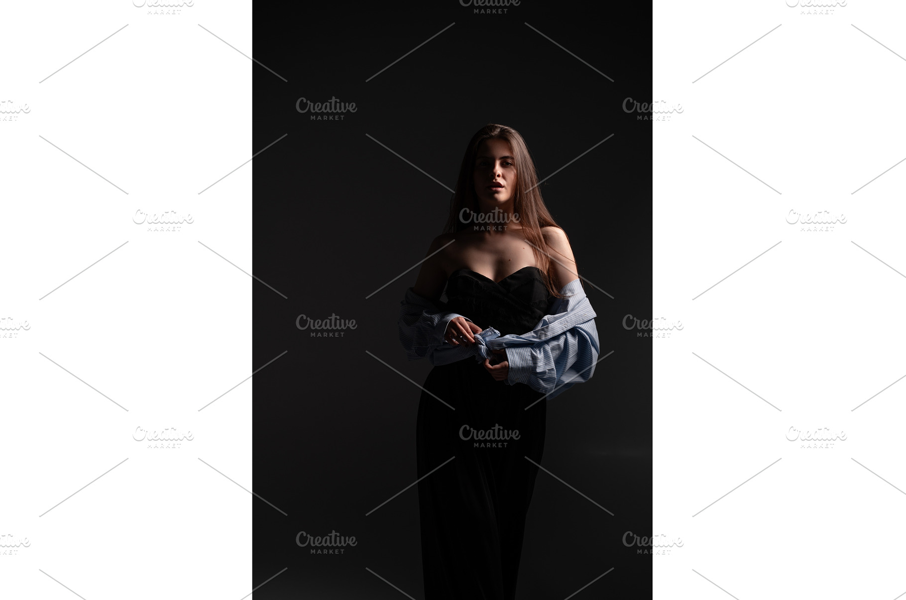Young woman posing gracefully in a, a Person Photo by volodymyrshtun13795