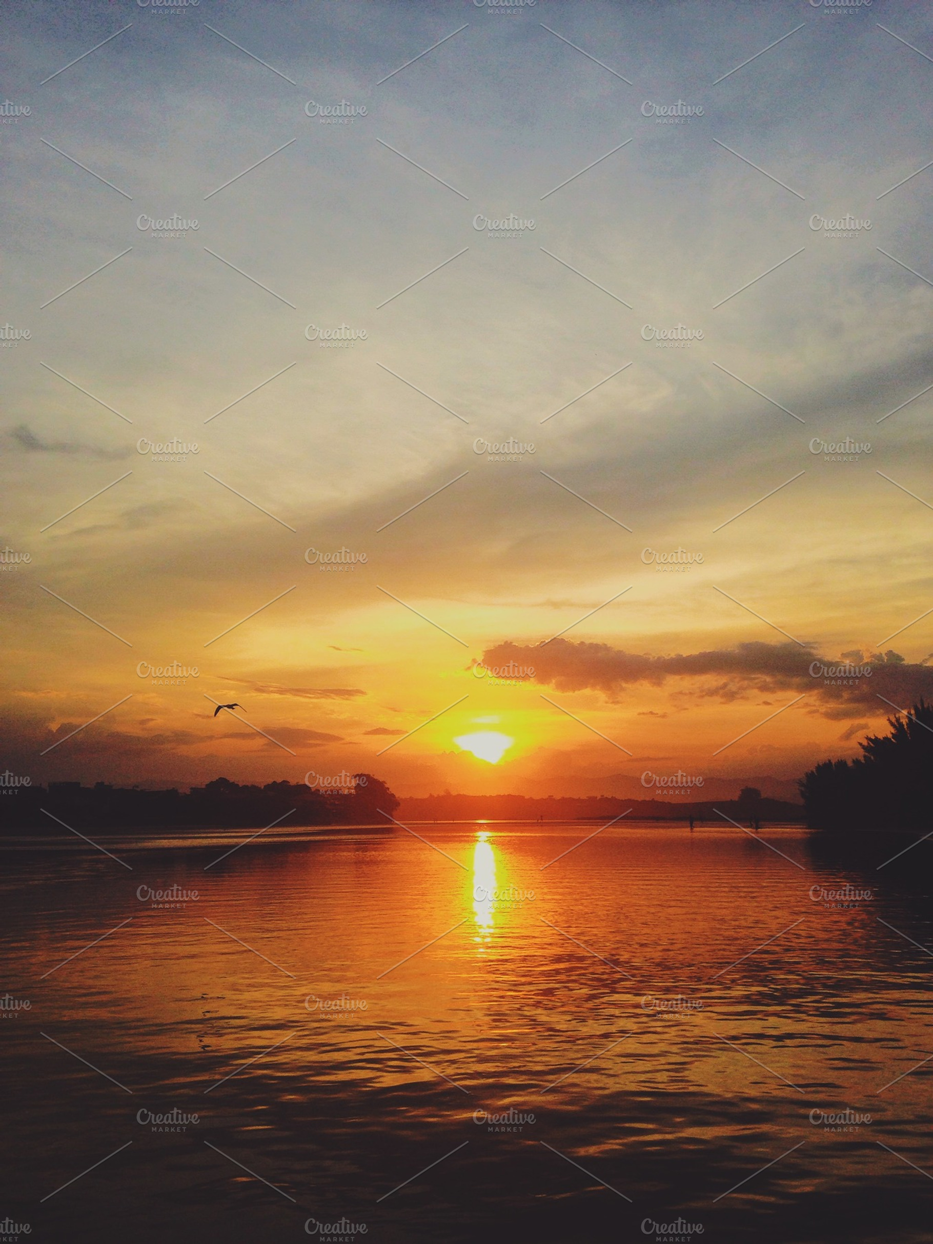 Sunset featuring paradise, lake, and beach, a Nature Photo by Diego Maffei