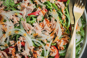 Fresh Tuna Salad with Onions and Cherry Tomatoes. Italian Mediterranean Cuisine, a Food & Drink Photo by Budarinphoto
