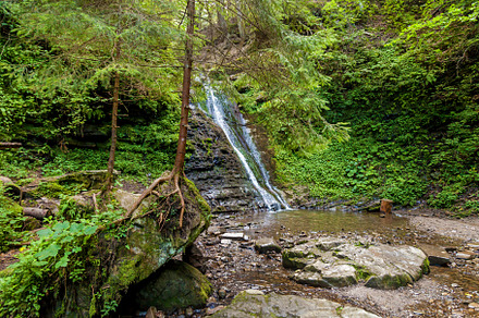 Forest waterfalls in the mountains, a Nature Photo by Photostock