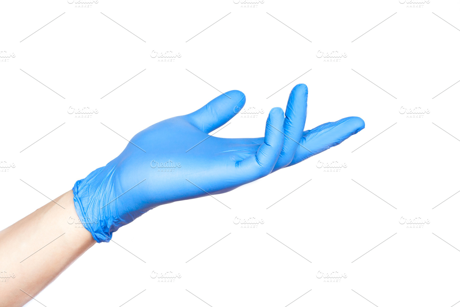 Doctor hand in blue gloves in holdin featuring background, blue, and care, a Health & Medical Photo by telnyaw