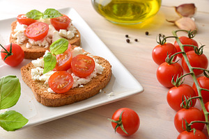 Tomato Ricotta Toasts on White Plate, a Food & Drink Photo by Davizro's Market