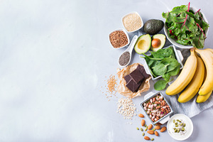 Assortment of healthy high magnesium sources food stock photo containing