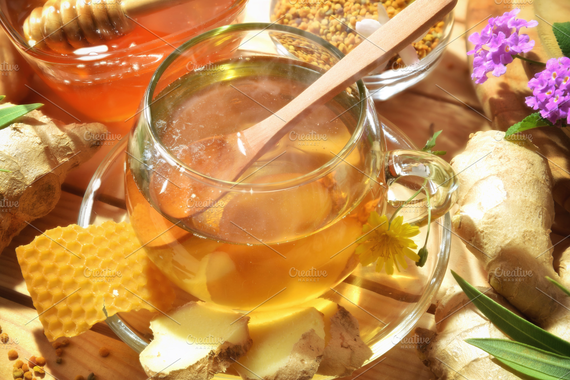 Honey and ginger infusion on wooden table with natural products, a Food & Drink Photo by Davizro's Market