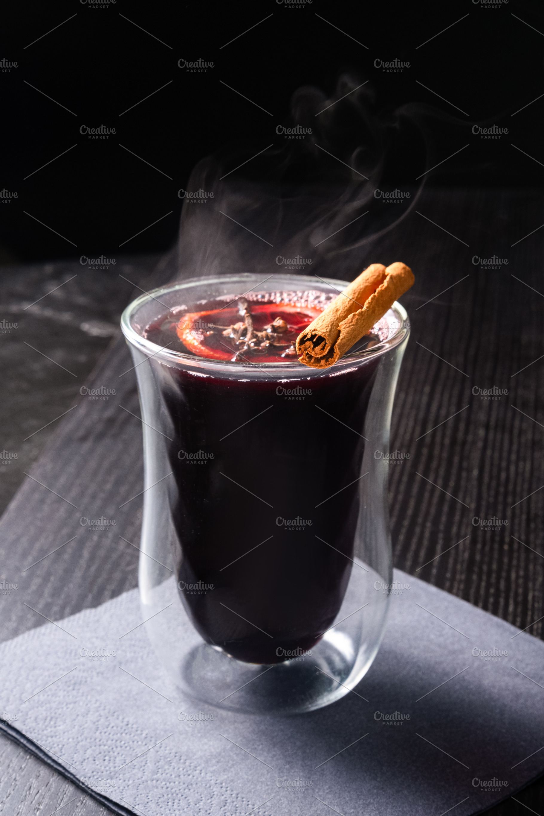Hot Mulled Wine with Orange Slice and Cinnamon Stick in Glass on, a Photo by MDBildes