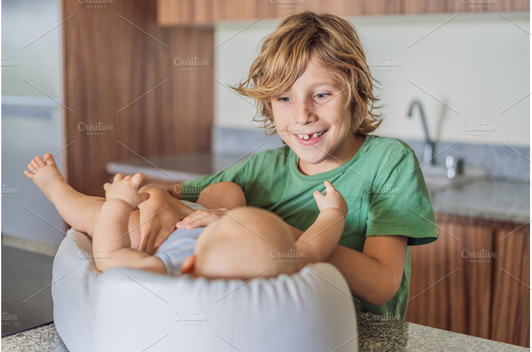 Older brother interacting with, a Nature Photo by Elizaveta Galitskaya
