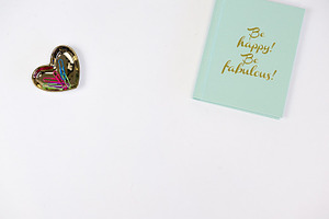 Mint notebook with gold heart dish featuring desk, rebecca nash photography