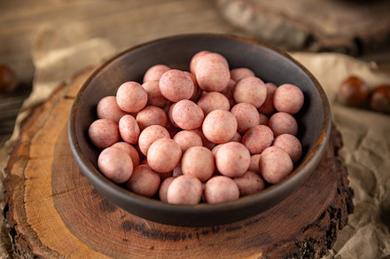 Bowl of covered hazelnuts, a Photo by Grafvision photography