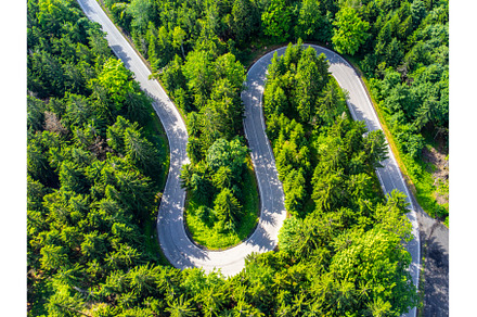 Road serpentine in the forest from, a Transportation Photo by pytyczech