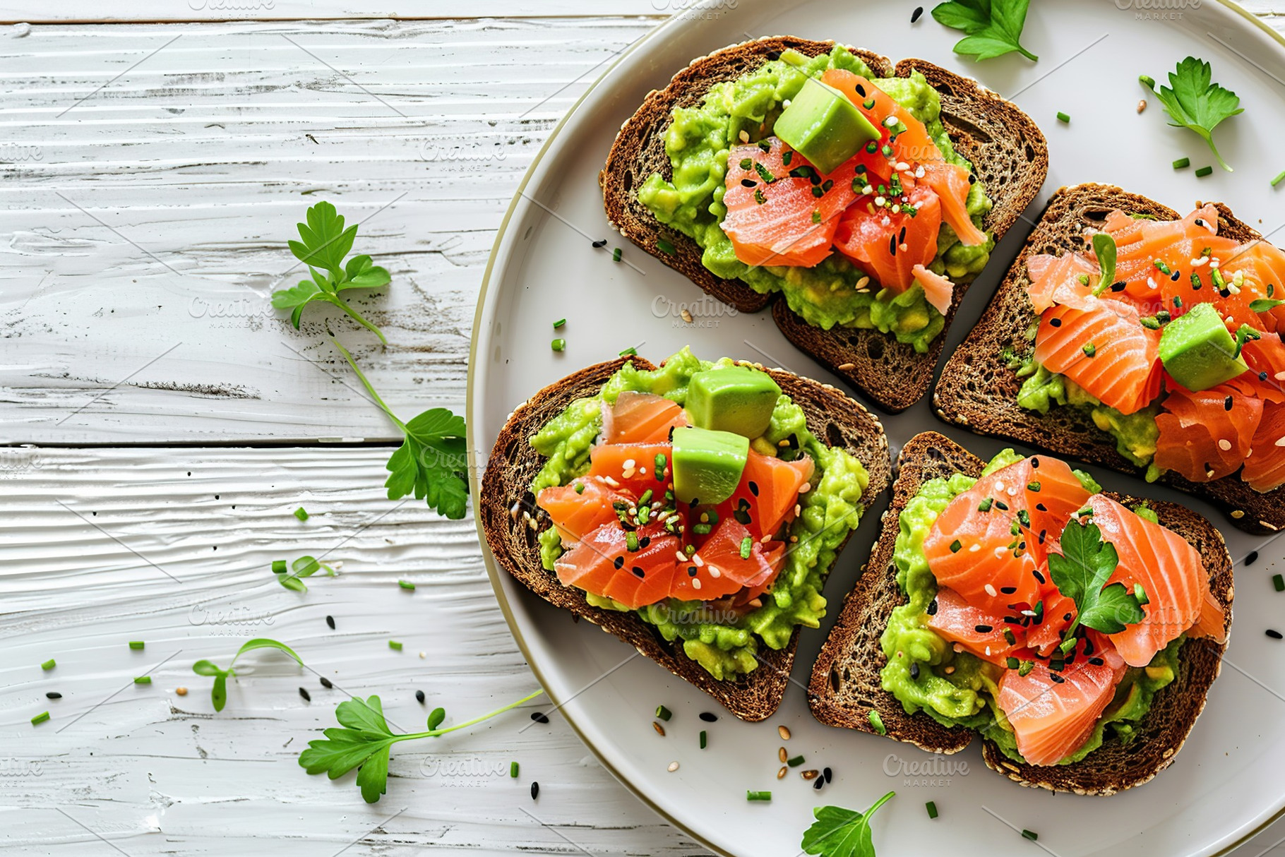 Toast bread with salted salmon and guacamole avocado in plate on wooden table, a Food & Drink Photo by AlyaAnd