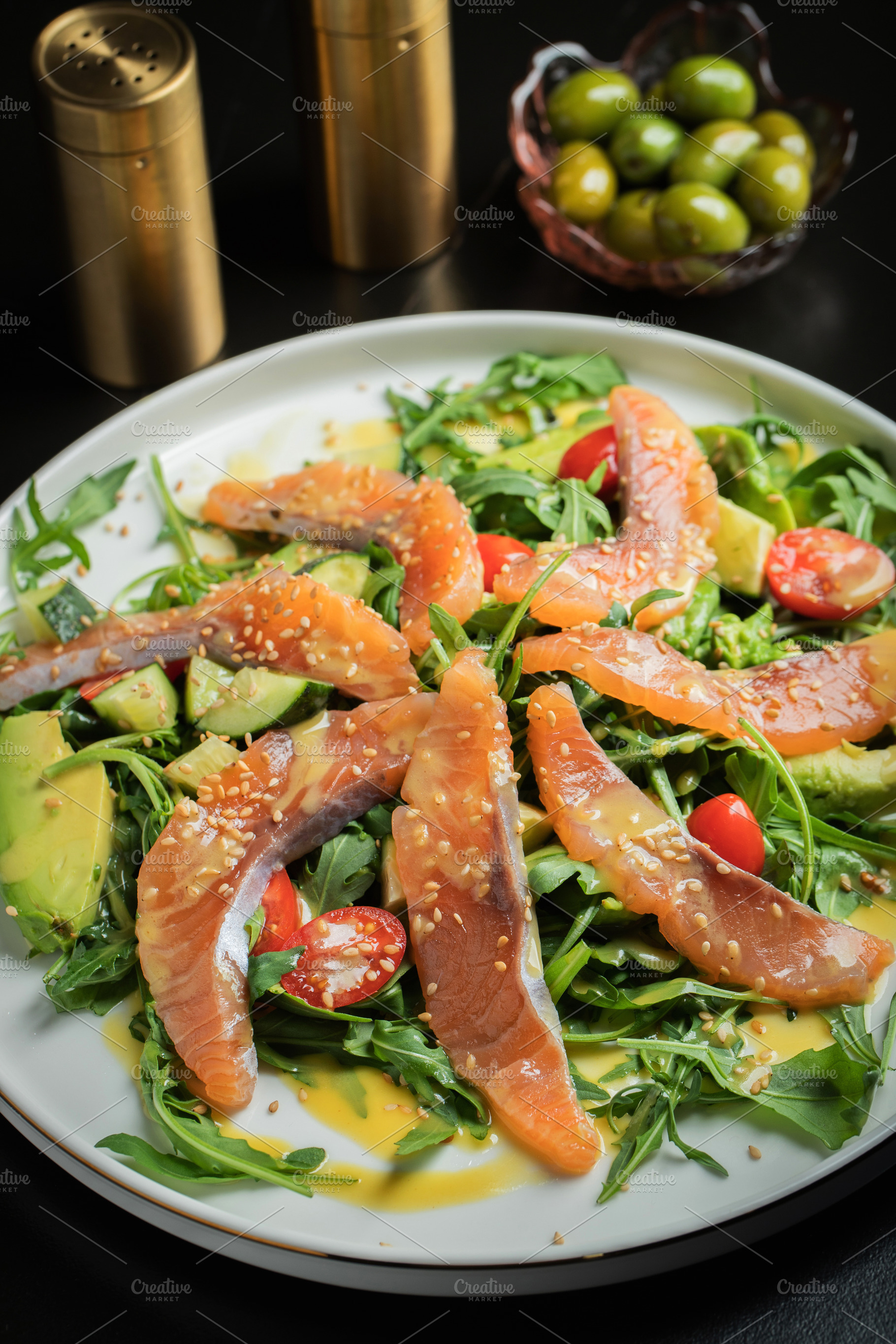 Salad with salted salmon and arugula, a Food & Drink Photo by Budarinphoto