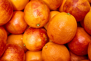 Fresh Blood Oranges in a Market Disp