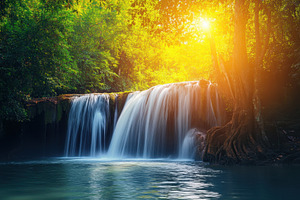 Majestic waterfall cascading through, a Photo by Iftikhar Alam