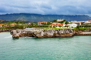 Llanes cliff, city aerial view, a Photo by saiko3p