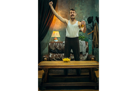 Winner overwhelmed cheerful man stock photo containing match and fan, a Sports & Recreation Photo by Volodymyr Melnyk