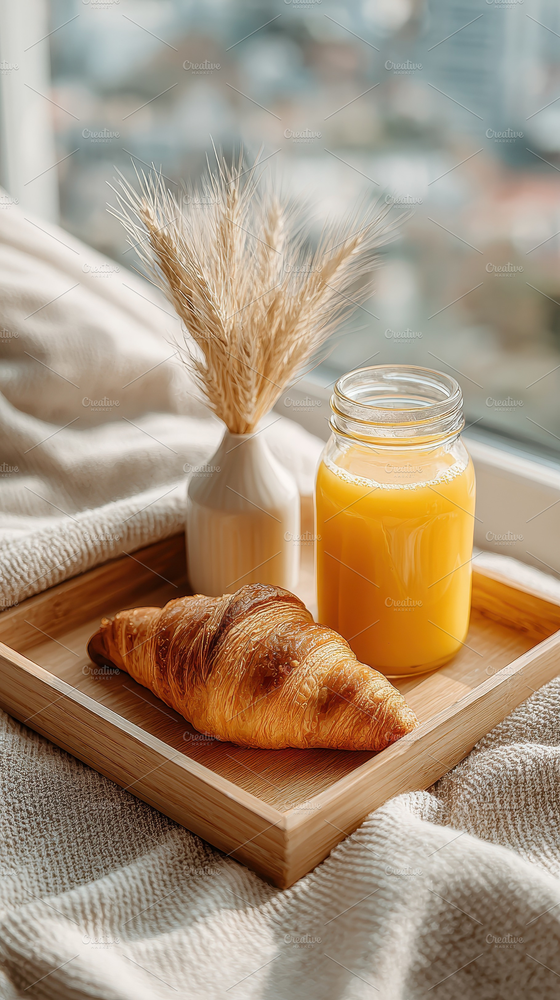 Delicious breakfast croissant orange, a Photo by Pixeness Studio