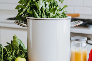 White pot with fresh herbs and veget, a Photo by Dvoevnore photos