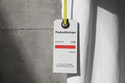 Paper Tag Hangs from T-Shirt Mockup, a Shirt Mockup by PinchesMockups© (Thumbnail 3 of 4)