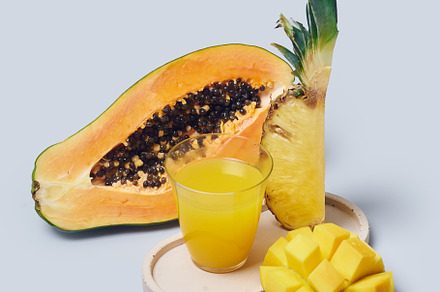 Tropical fruits variety on a colorful background. Side view with