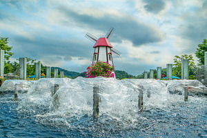 Street park with fountain and windmill in Daejeon South Korea, horizontal, a Nature Photo by iuliia_n