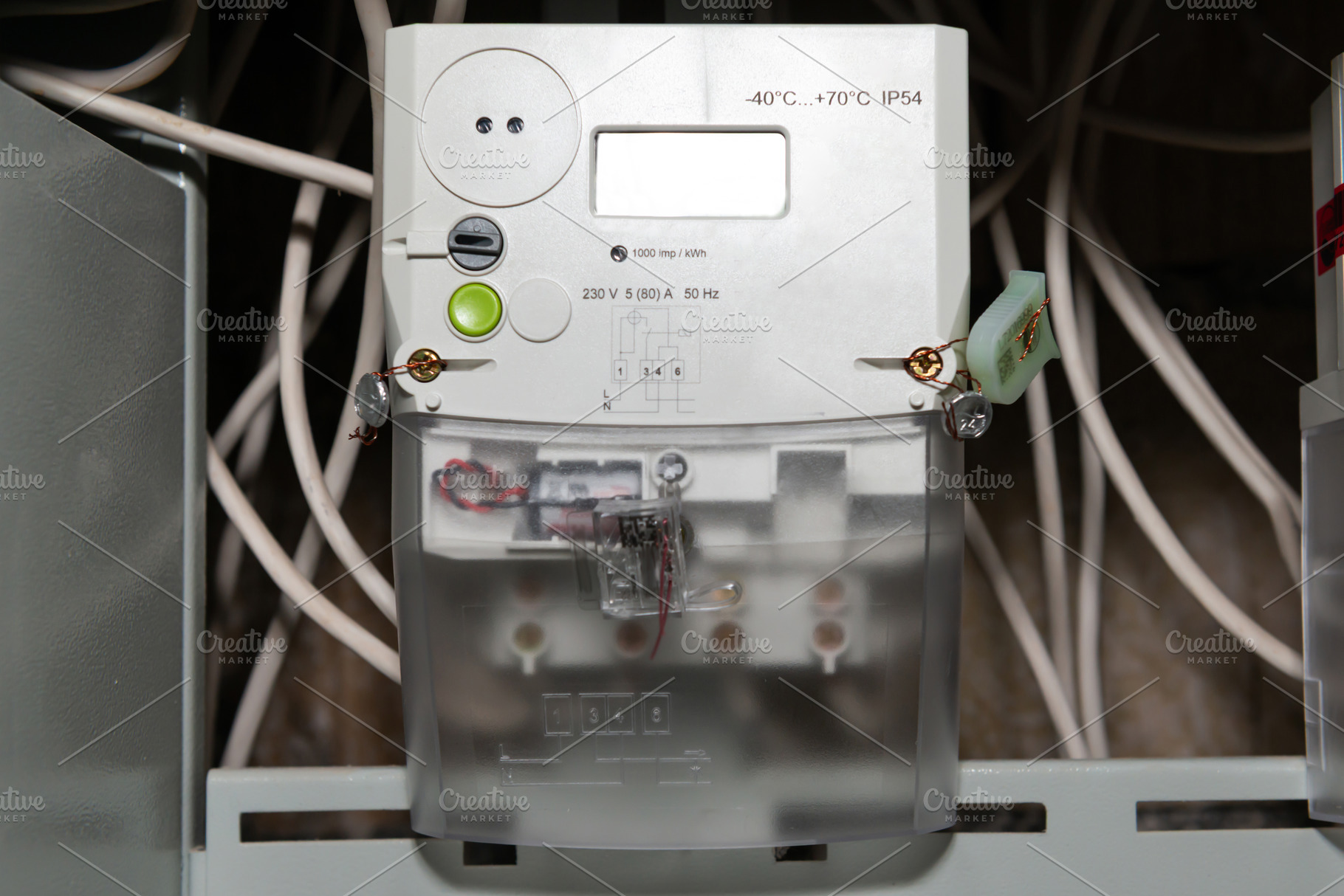 Electrical meter with electrical power cables, a Technology Photo by Vapi