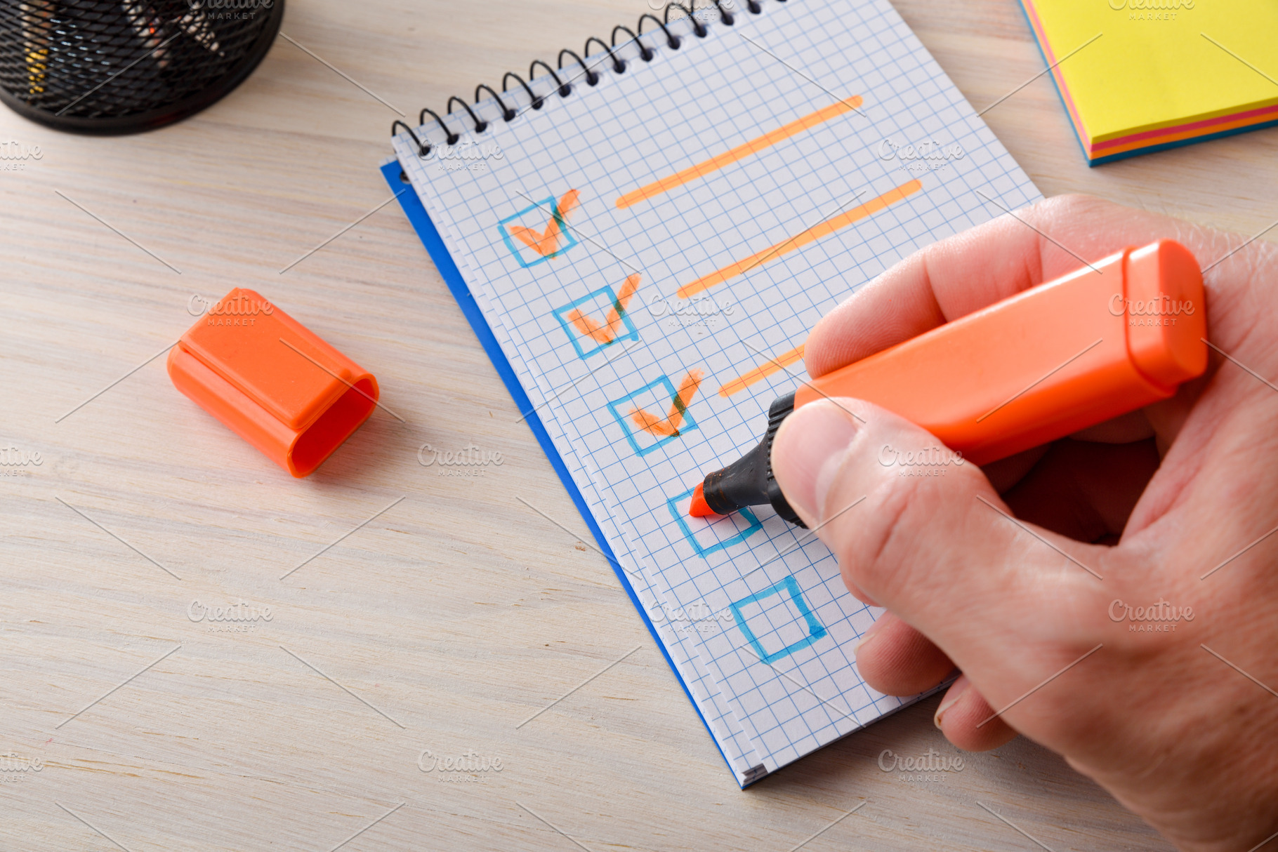 Hand Completing Checklist with Orange Marker, a Business Photo by Davizro's Market