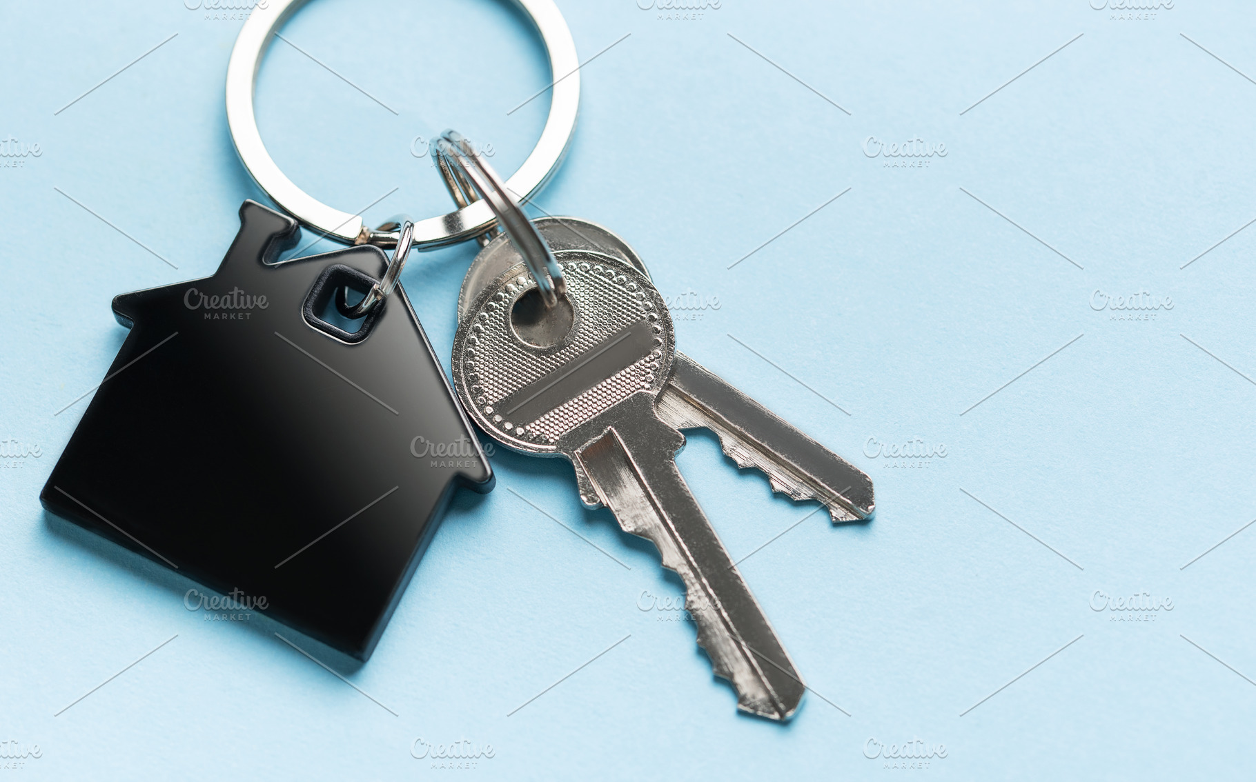 House keys with keychain representing new home ownership, a Business Photo by Olena Rudo
