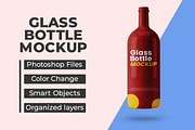 Red glass bottle mockup, a Packaging Mockup by Viswal Studio (Thumbnail 1 of 2)