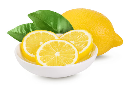 Ripe lemon slices in ceramic bowl, a Food & Drink Photo by NataPhoto