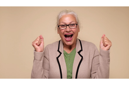 An elderly European woman is