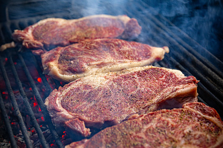 Beef steaks on grill, a Photo by Grafvision photography