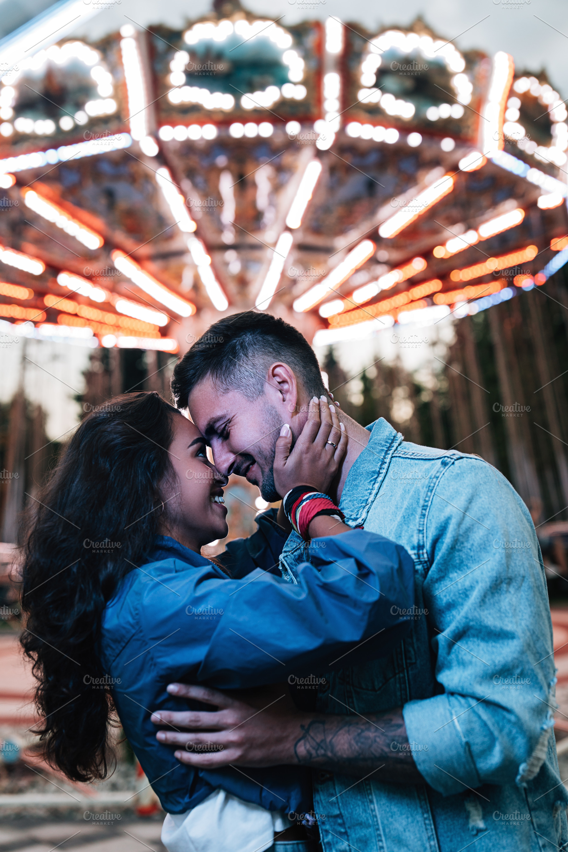 Young smiling couple in park, a Person Photo by Artem Varnitsin