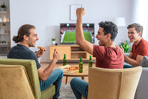 Friends Watching Soccer Match and Celebrating Together, a Photo by Davizro's Market