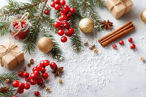 Festive holiday gifts with decorations on snow, a Holiday Photo by AlyaAnd