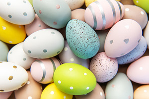 Colorful easter eggs with pastel patterns and dots background, a Holiday Photo by Olena Rudo