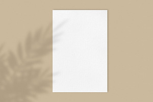 Blank poster on brown background, a Business Photo by BOOCYS