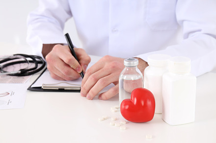 Doctor sitting at workplace on white background, a Person Photo by AtlasStudio PRO