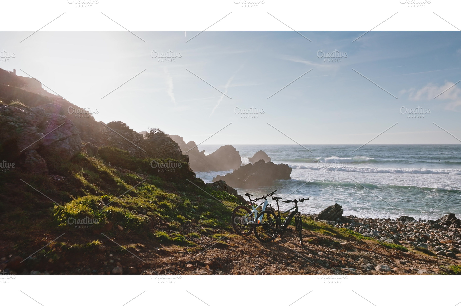 Bicycles standing on coastal path, a Nature Photo by Goinyk